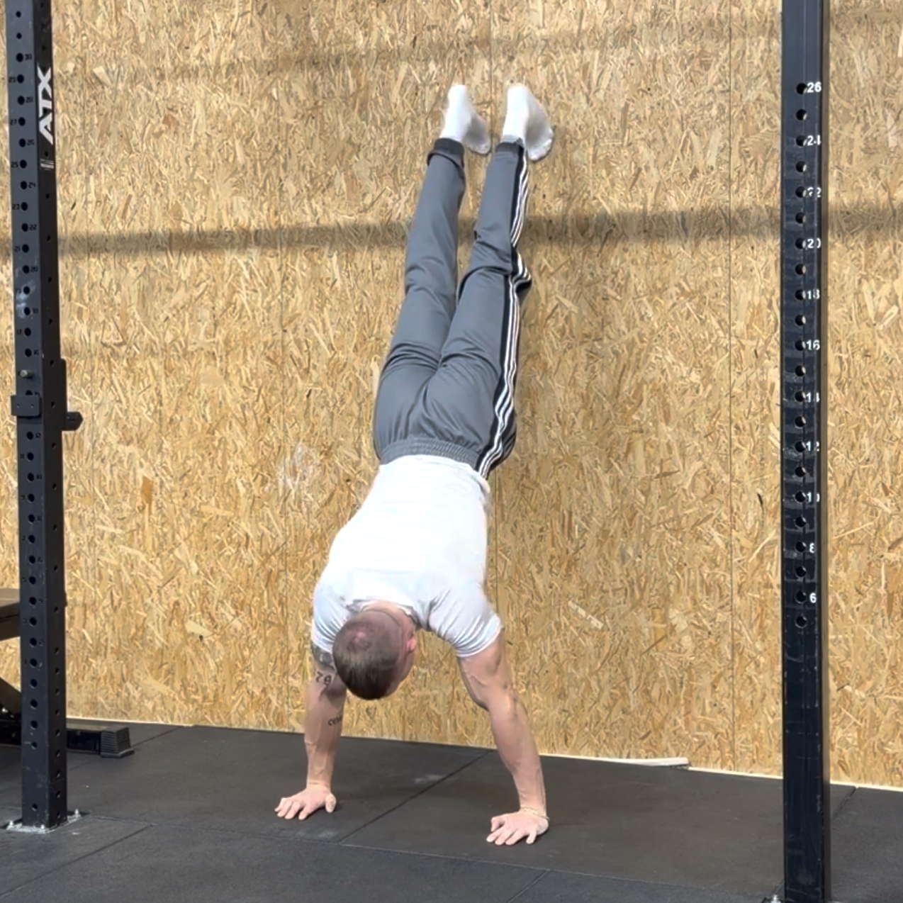 Wall Handstand + Push Up Background